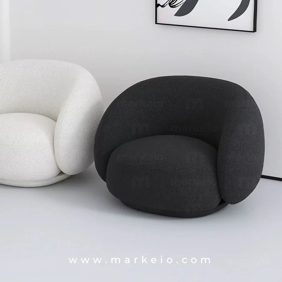 Fauteuil Curve rotatif 360 degrés en tissu bouclé