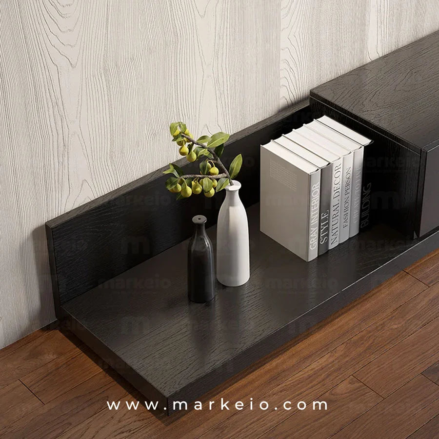Meuble TV minimaliste noir pour une décoration intérieure élégante au Maroc.