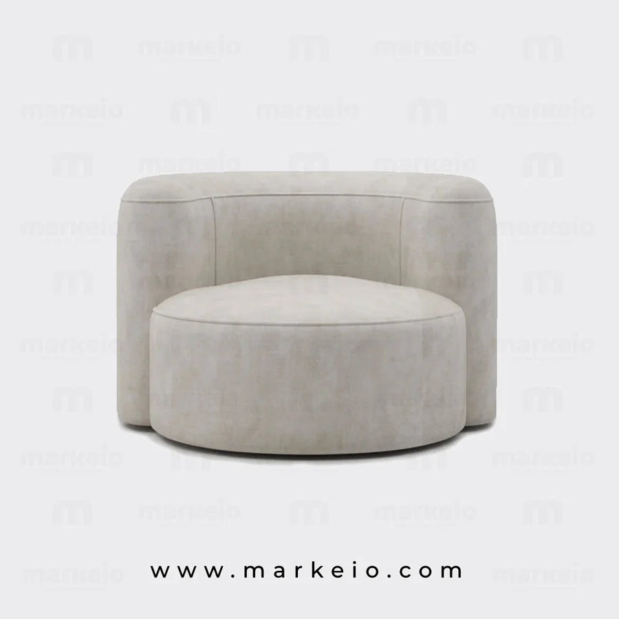 Gros plan sur la texture douce et l'assise confortable du fauteuil design Ello