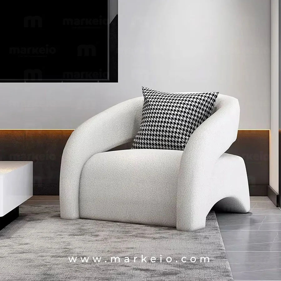 Fauteuil design Artico de la collection Markeio avec repose-pieds ergonomique.