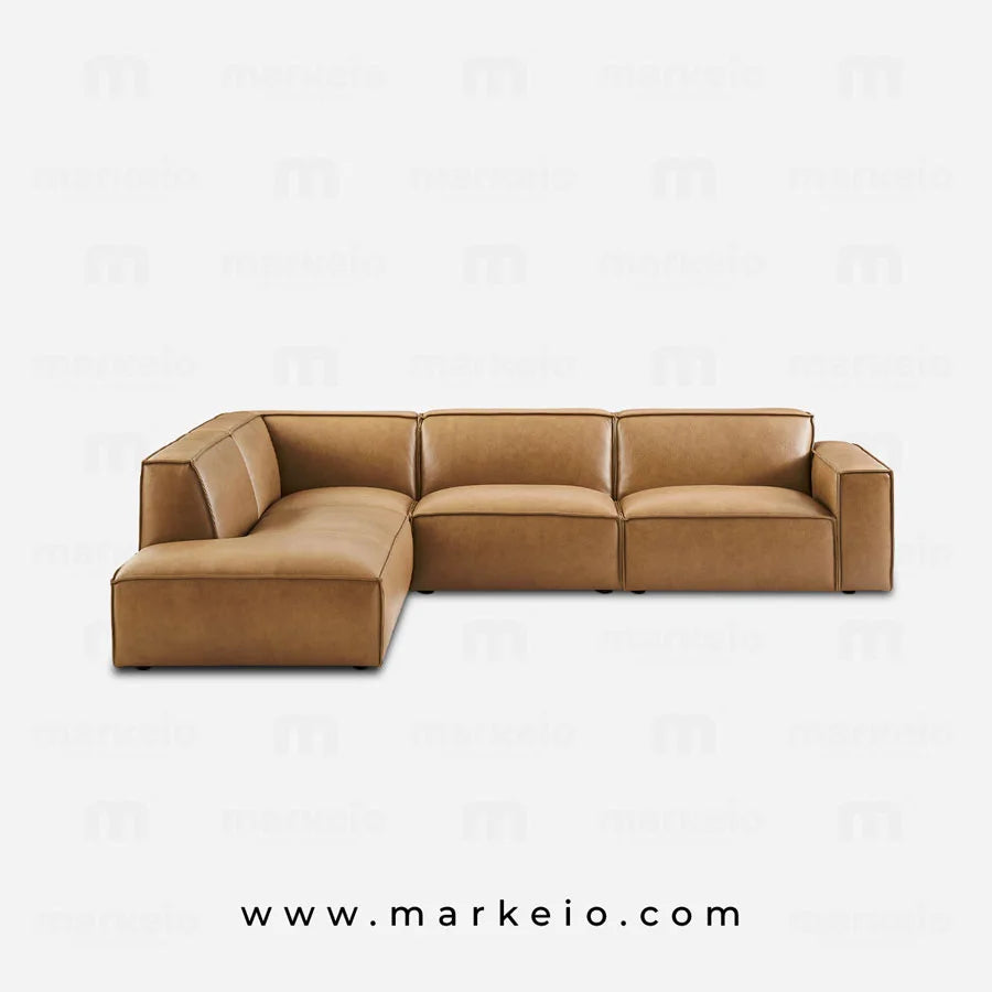 Grand canapé d'angle design en similicuir caramel disponible chez Markeio Casablanca.