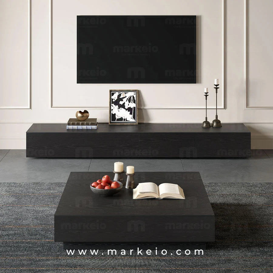 Mobilier TV noir avec rangements invisibles pour un intérieur épuré.