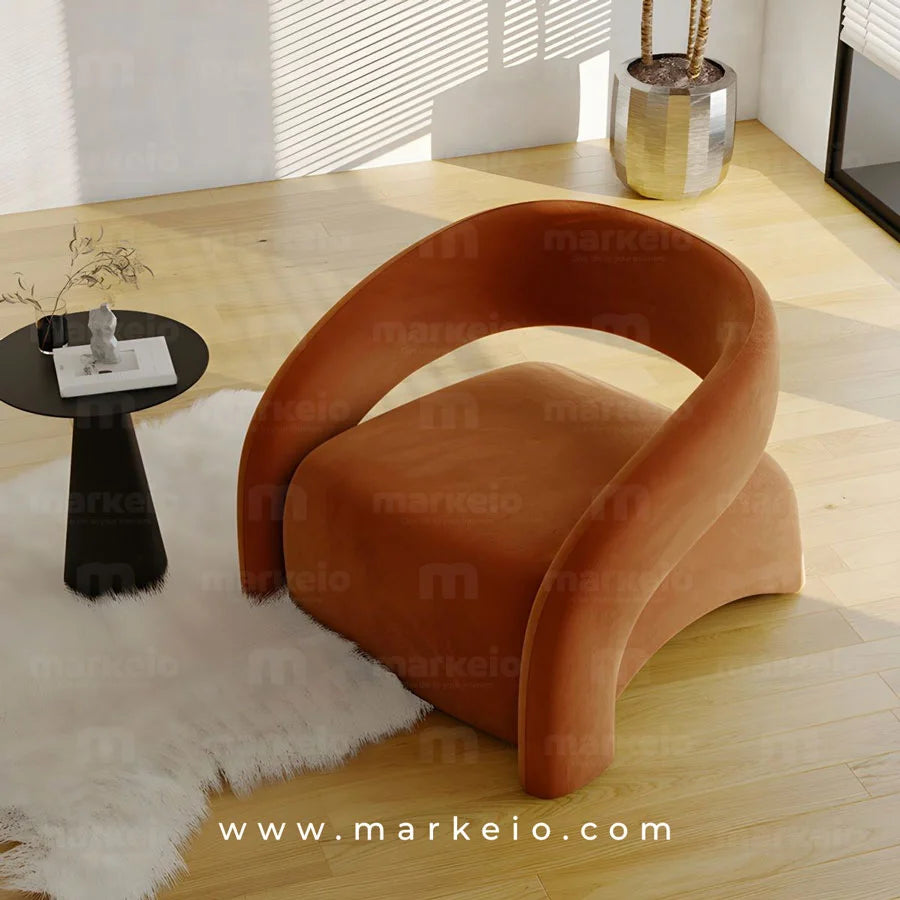 Aménagement d'un coin lecture élégant avec le fauteuil et pouf Artico.