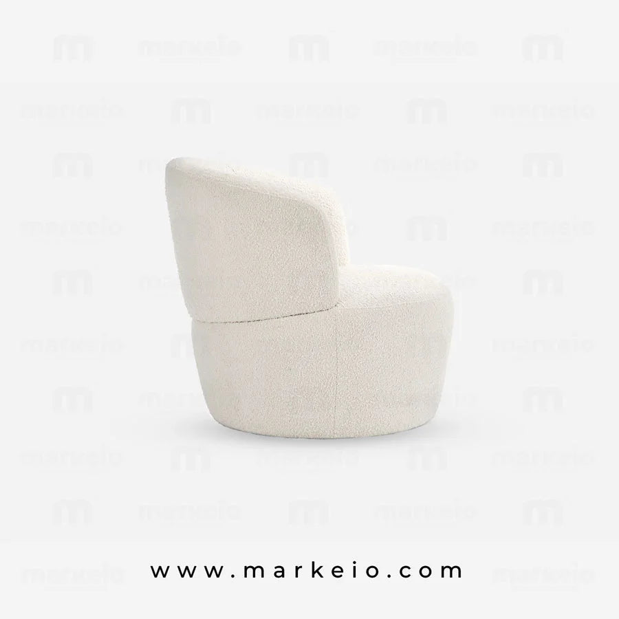 Fauteuil blanc pour un coin lecture sophistiqué à Rabat.