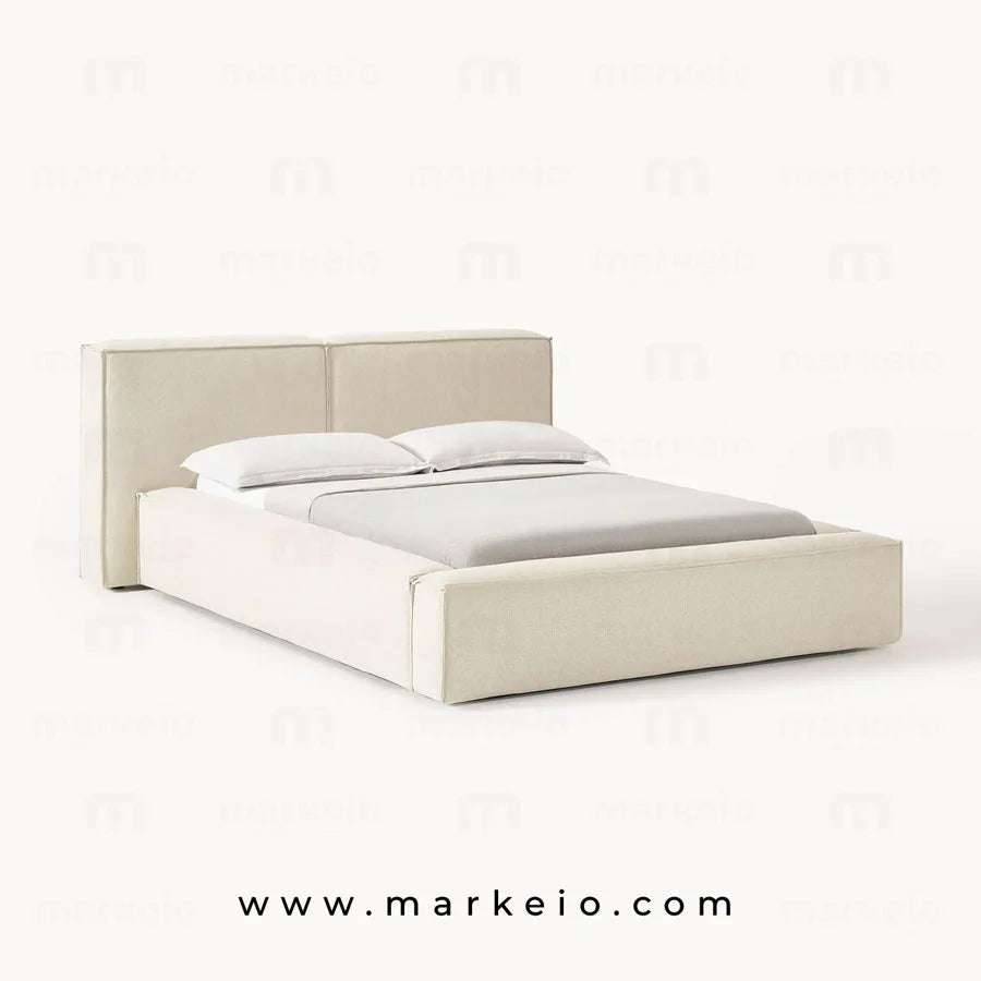 Vue d'ensemble du lit Divano gris avec système de rangement intégré.