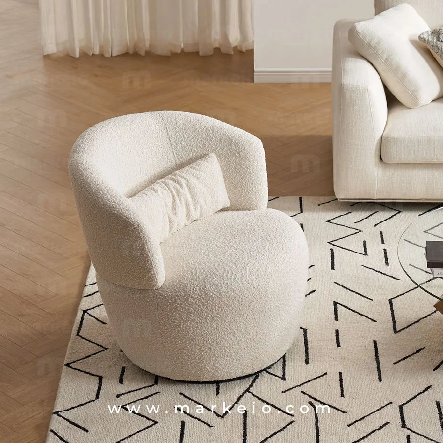 Fauteuil de salon moderne sans pieds apparents pour un look épuré.