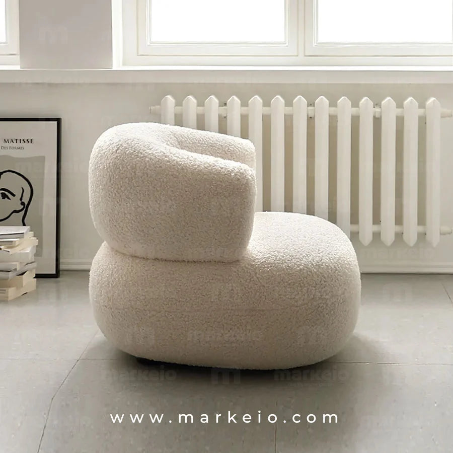 Fauteuil d'architecte Ukimo en tissu effet laine de mouton blanche