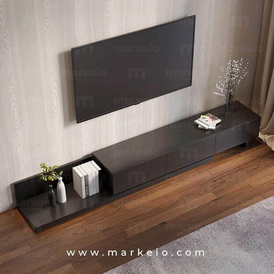 Meuble de salon noir mat avec finitions texturées effet bois naturel.