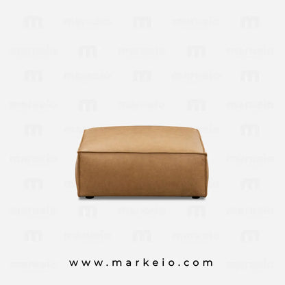 Pouf Divano marron caramel dans un salon moderne à Casablanca