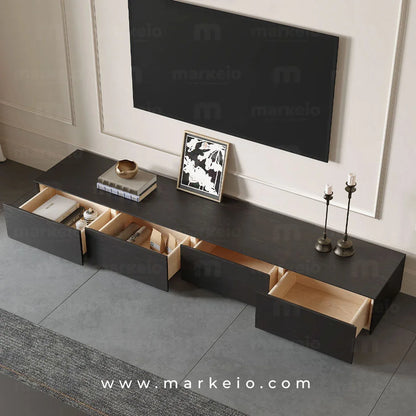 Grand meuble TV noir mat pour un salon au style contemporain.