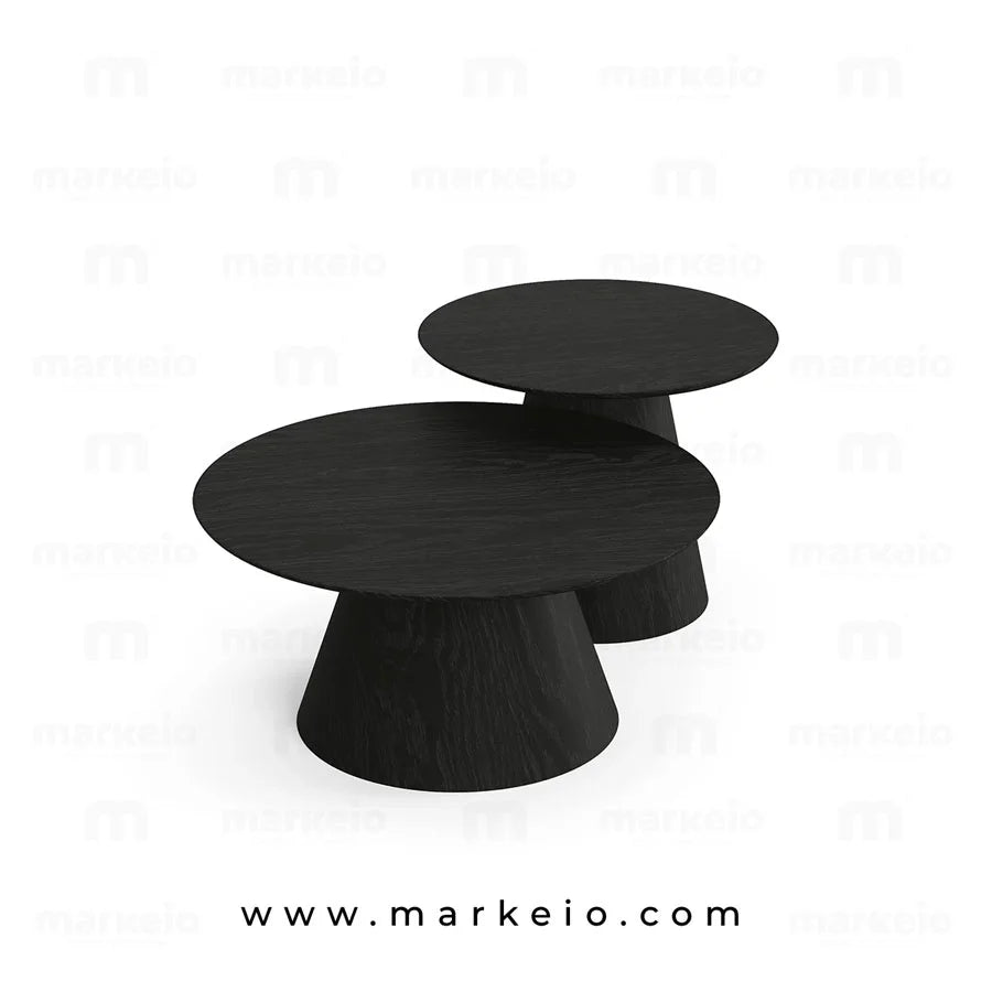 Table basse ronde noire mate au design architectural et moderne.