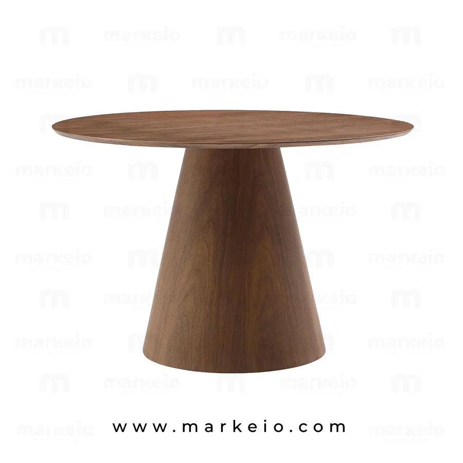 Table design Conik Noyer installée dans une salle à manger de standing