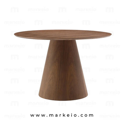 Table design Conik Noyer installée dans une salle à manger de standing