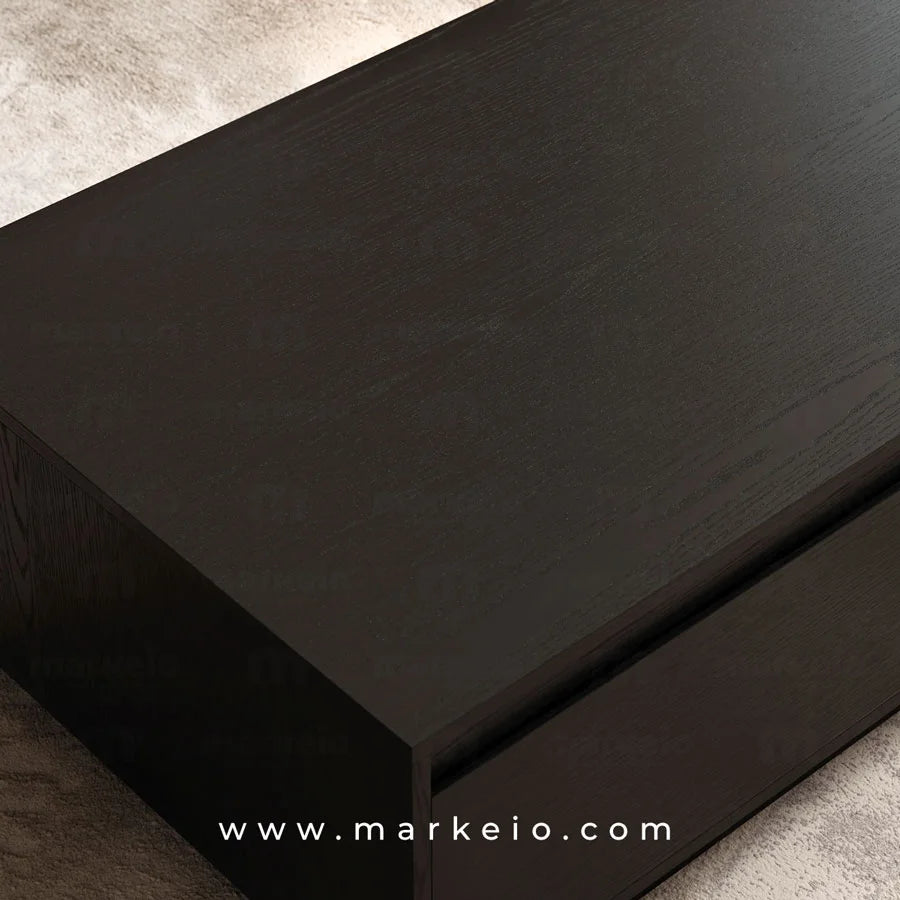 Table basse fonctionnelle 4 tiroirs sans poignées signée Markeio.
